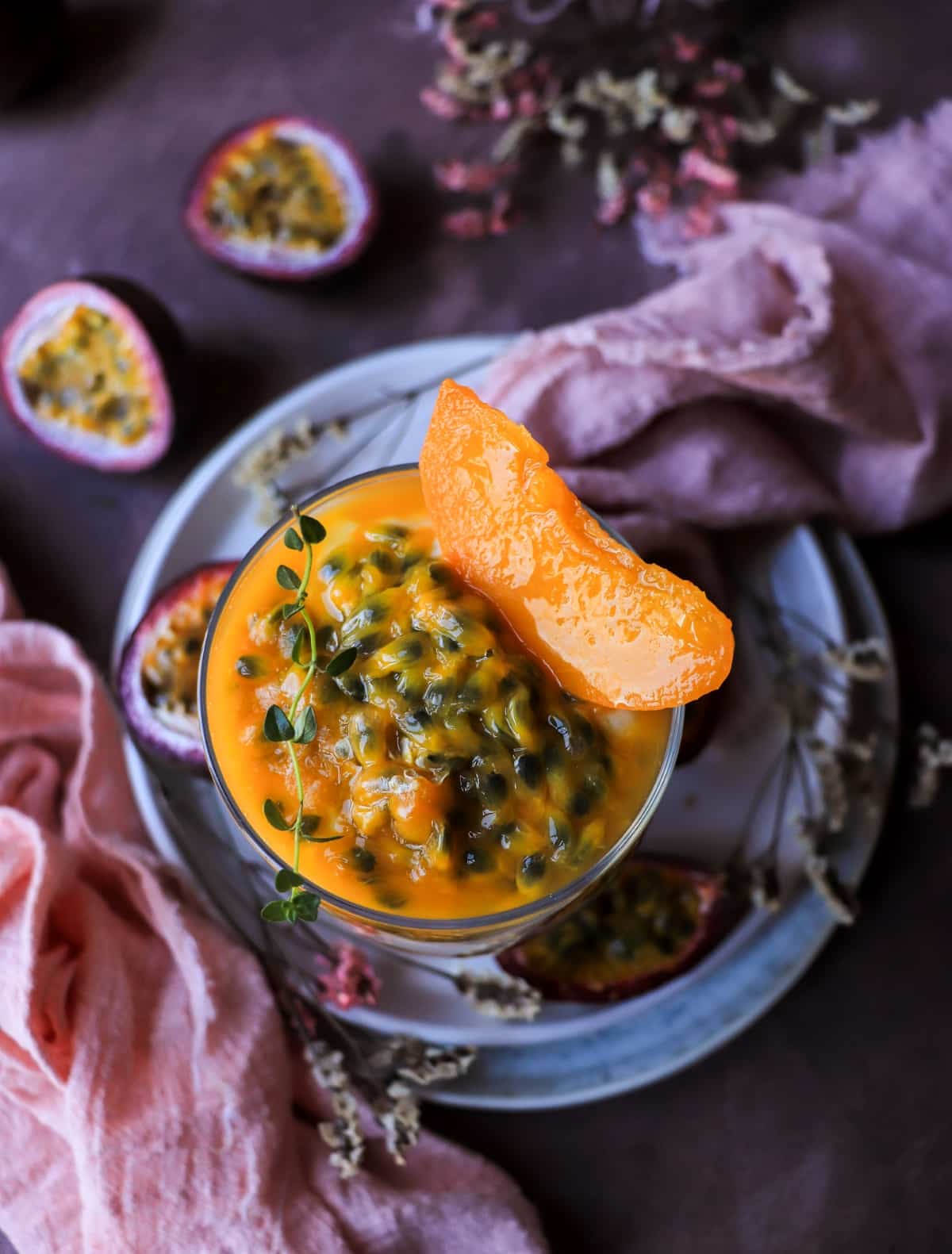 No-bake peach parfait topped with passion fruit