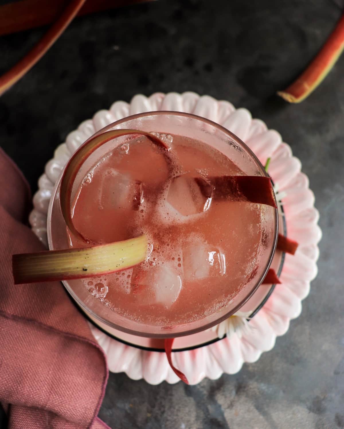 sparkling rhubarb drink with fresh rhubarb garnish.