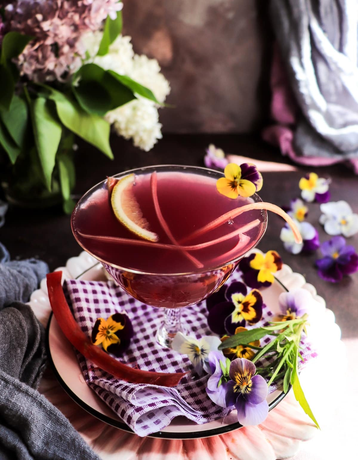 rhubarb gin sour with violet liqueur