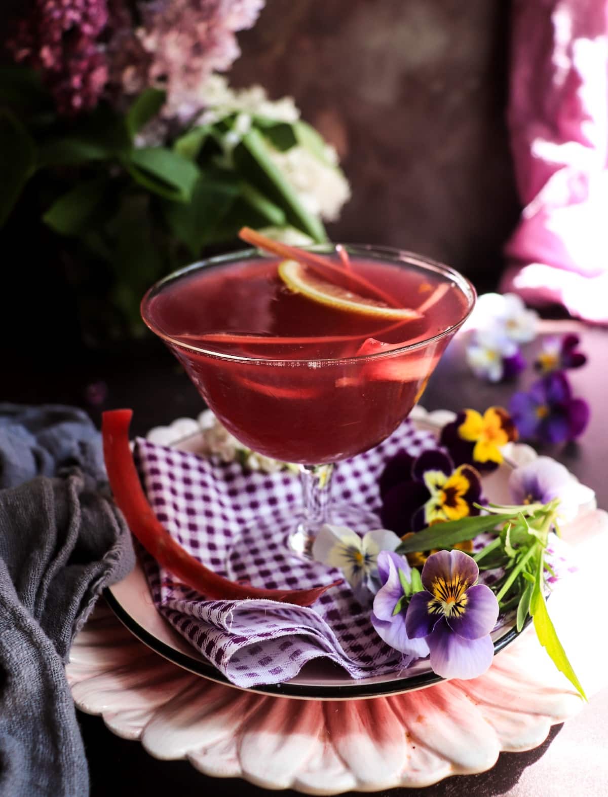 Rhubarb gin sour cocktail with crème de violette