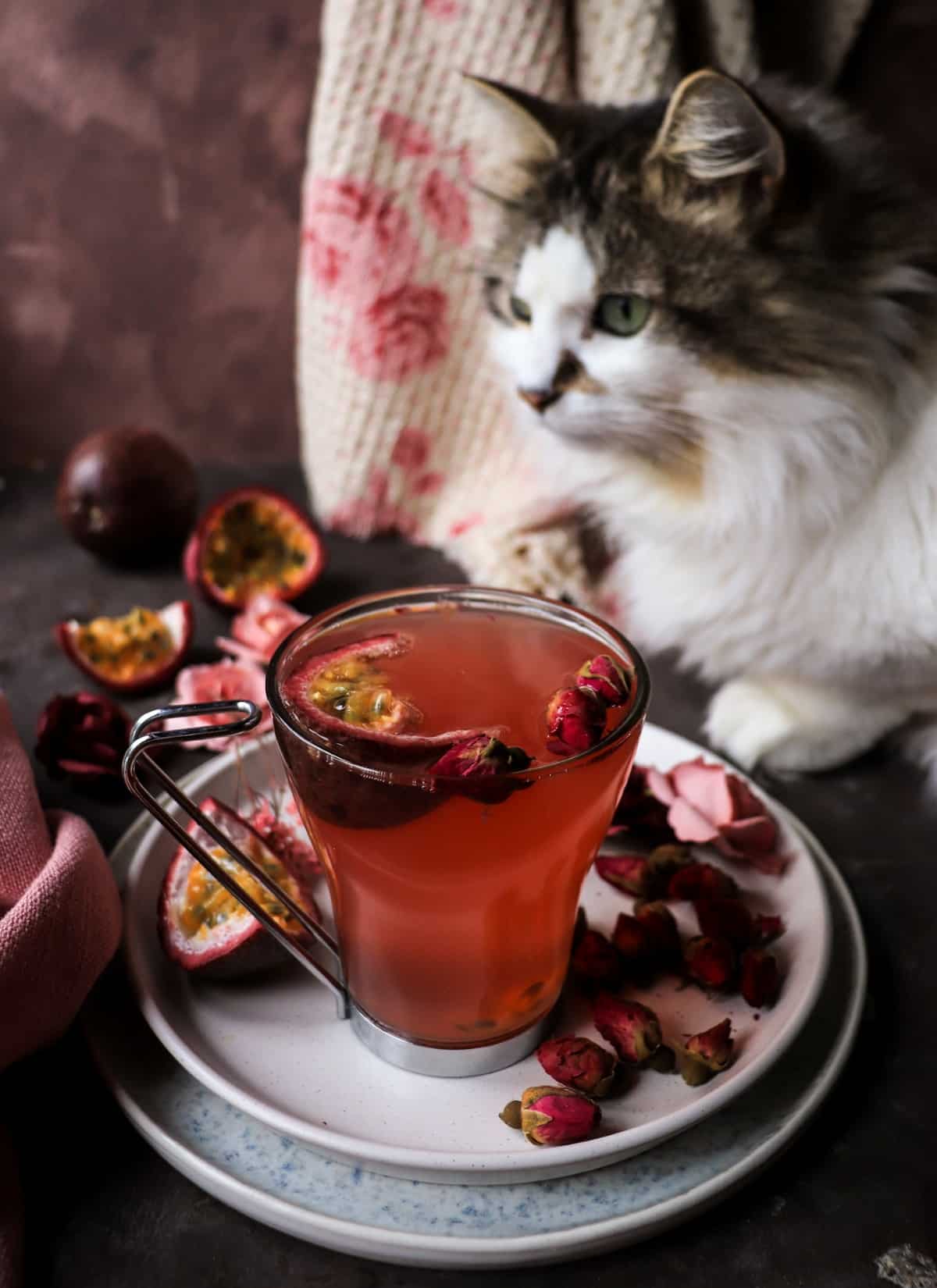 Floral herbal tea with rose buds, passion fruit