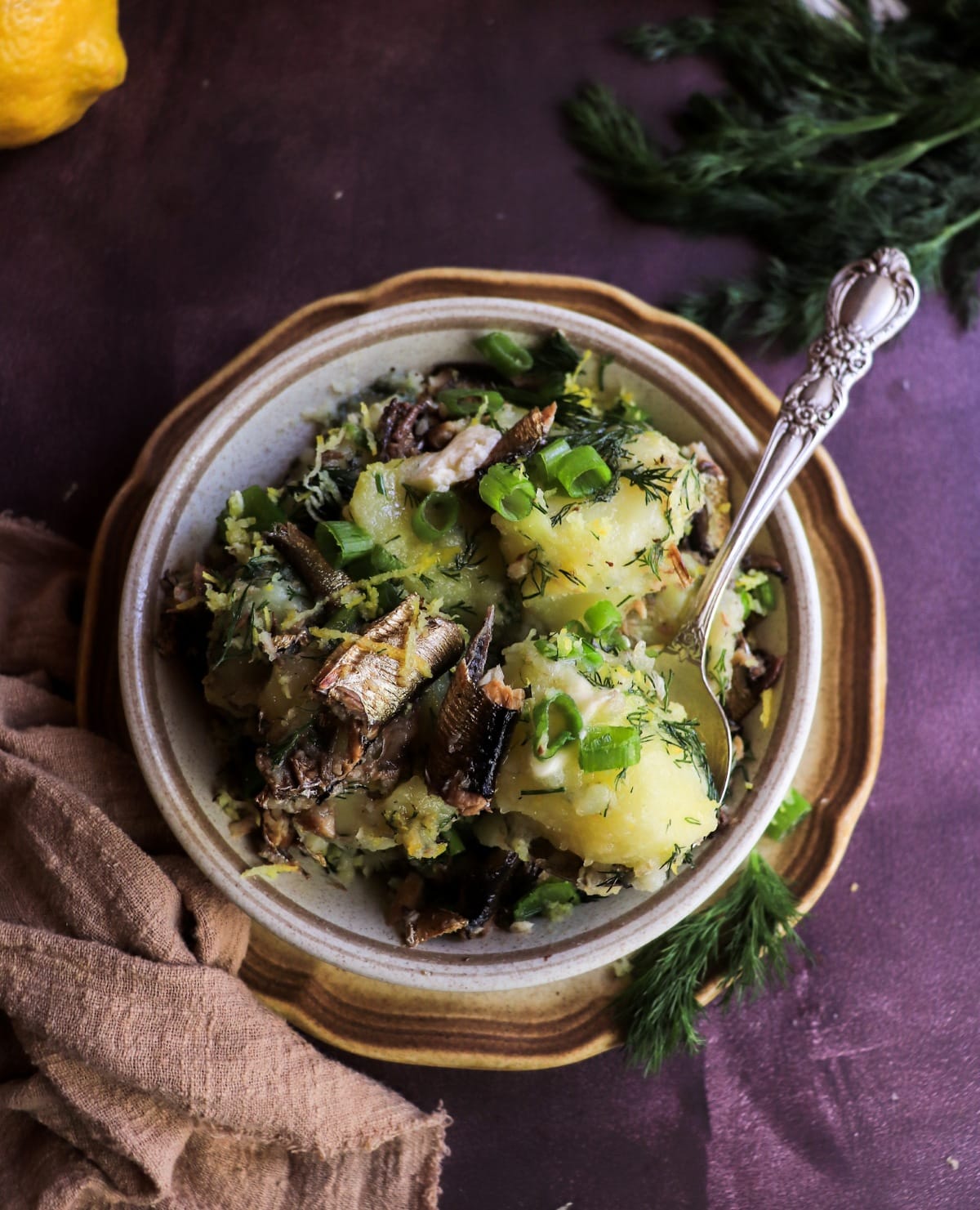 Rustic boiled Potatoes with Smoked Sprats, Dill, and Lemon