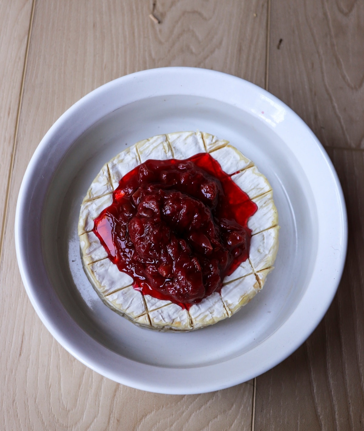Brie with homemade rose petal jam before baking