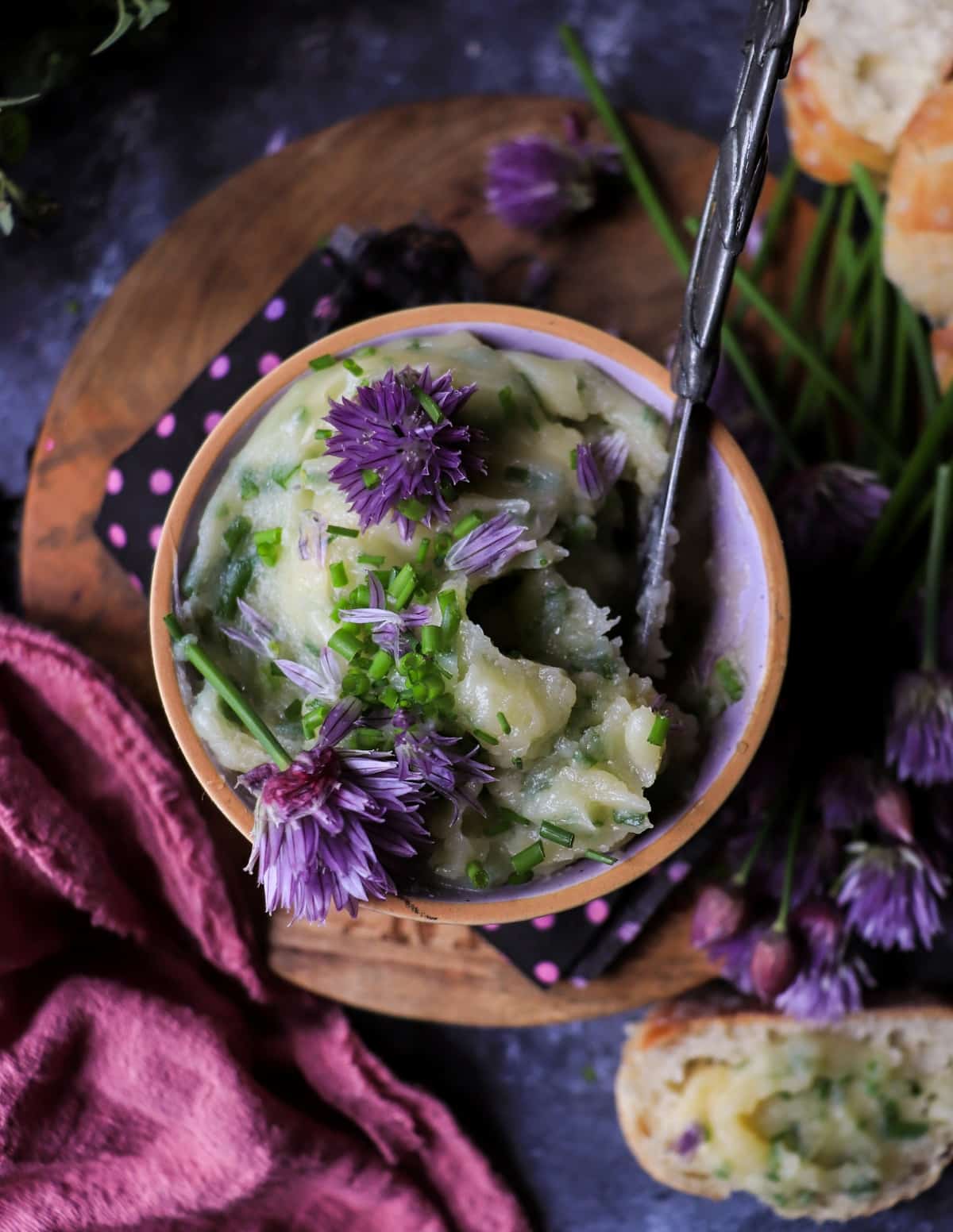 chive compound butter with honey and chive blossoms