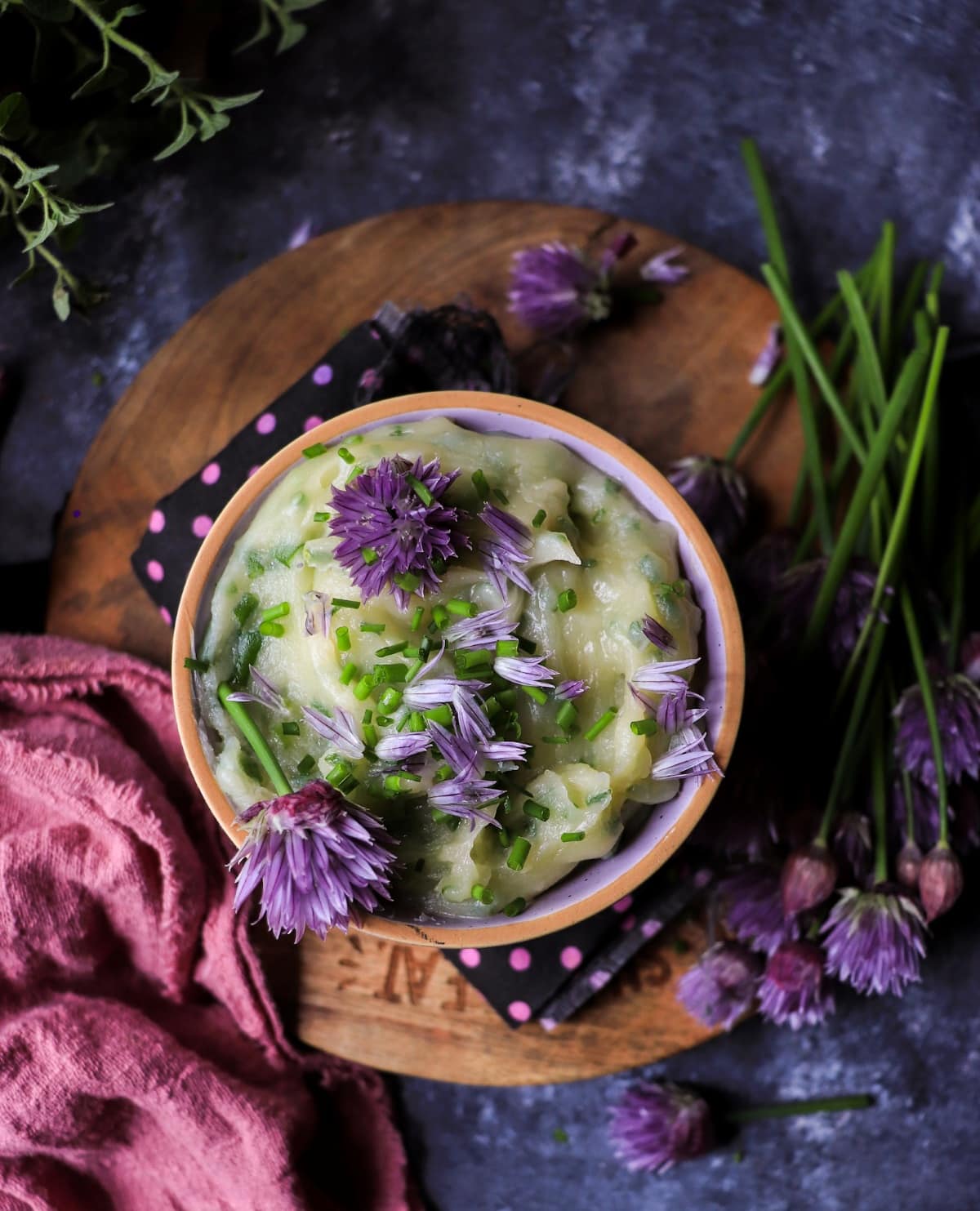 Compound butter with chive blossoms and fresh chives