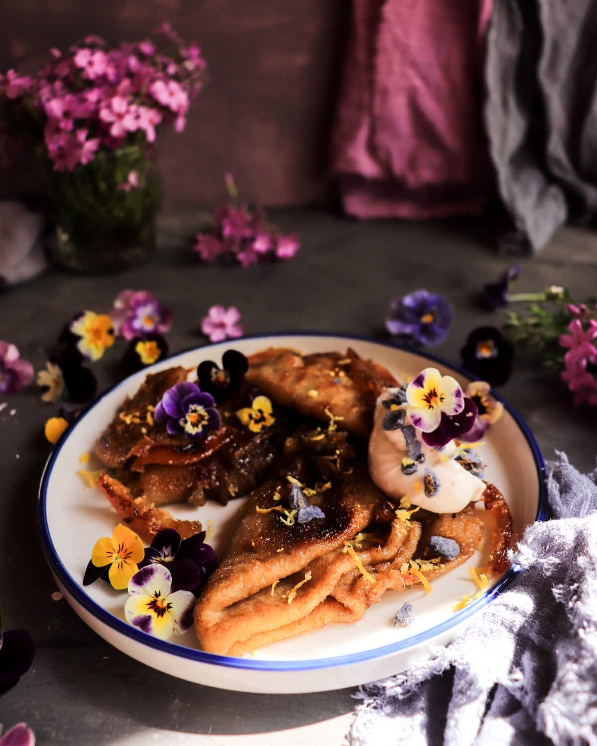 Crêpes Suzette with Violet Liqueur served with violet mascarpone and lemon zest