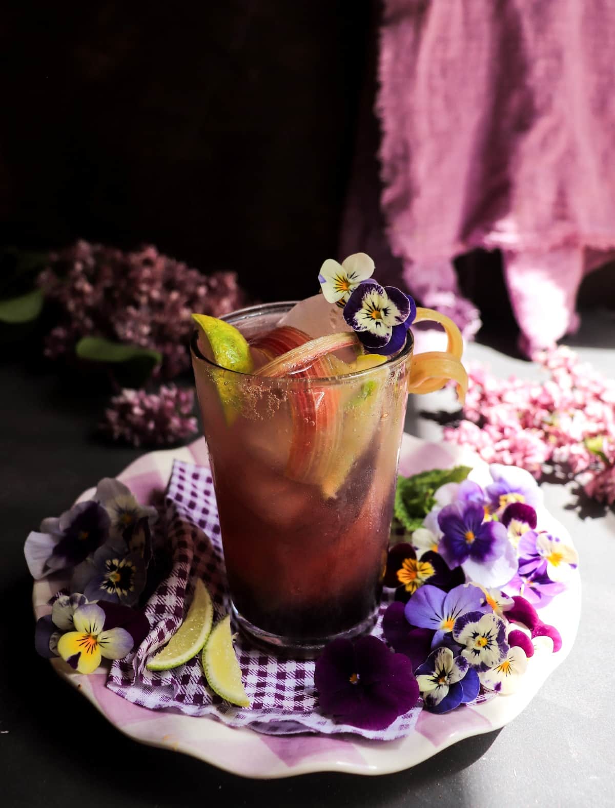Floral gin cocktail with rhubarb syrup and crème de violette
