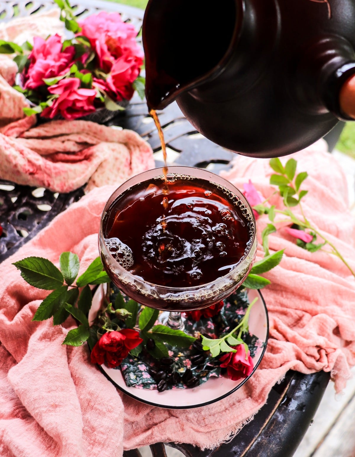 making rose affogato with espresso and amaretto liqueur