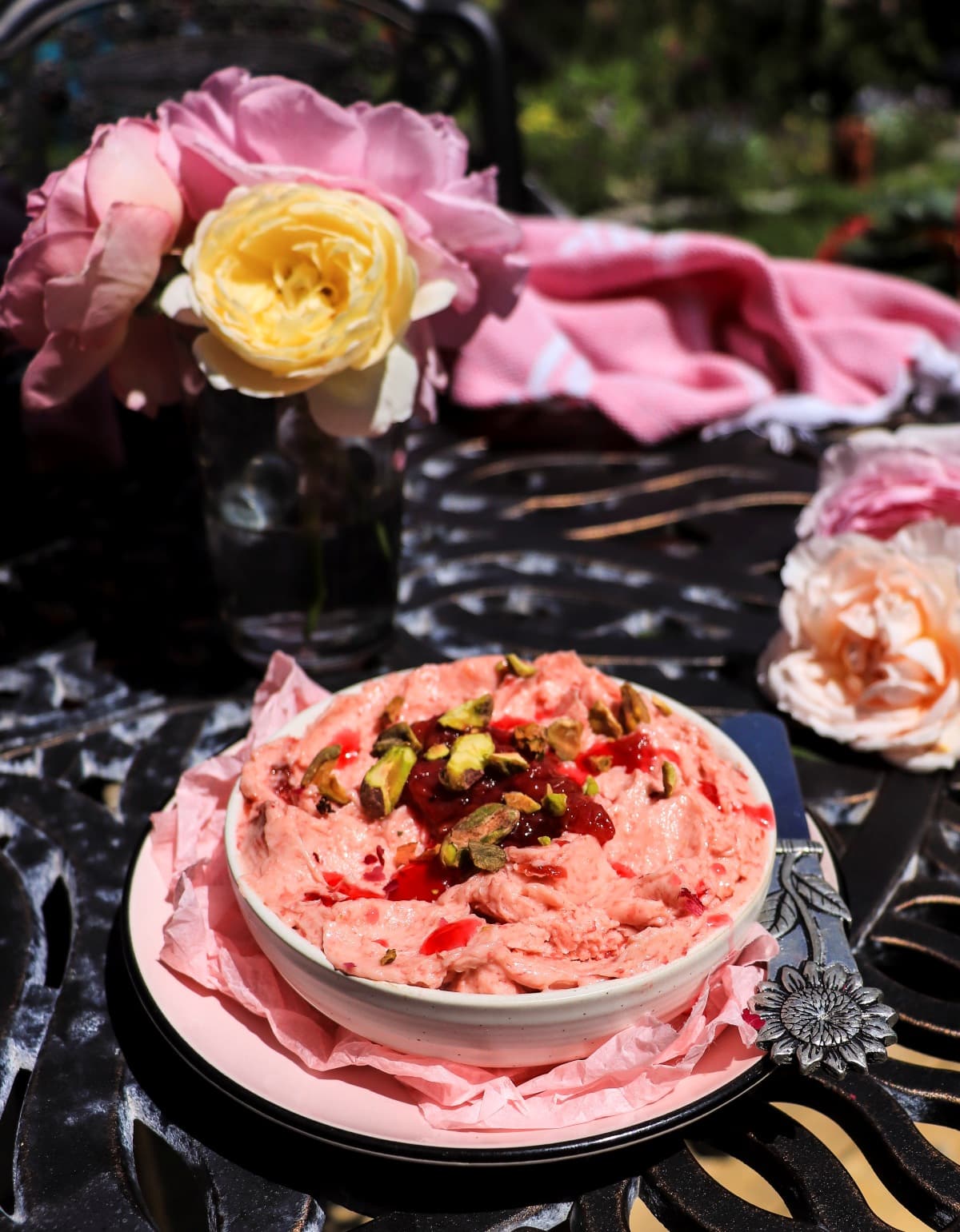 Rose butter with rose petal jam topped with pistachios