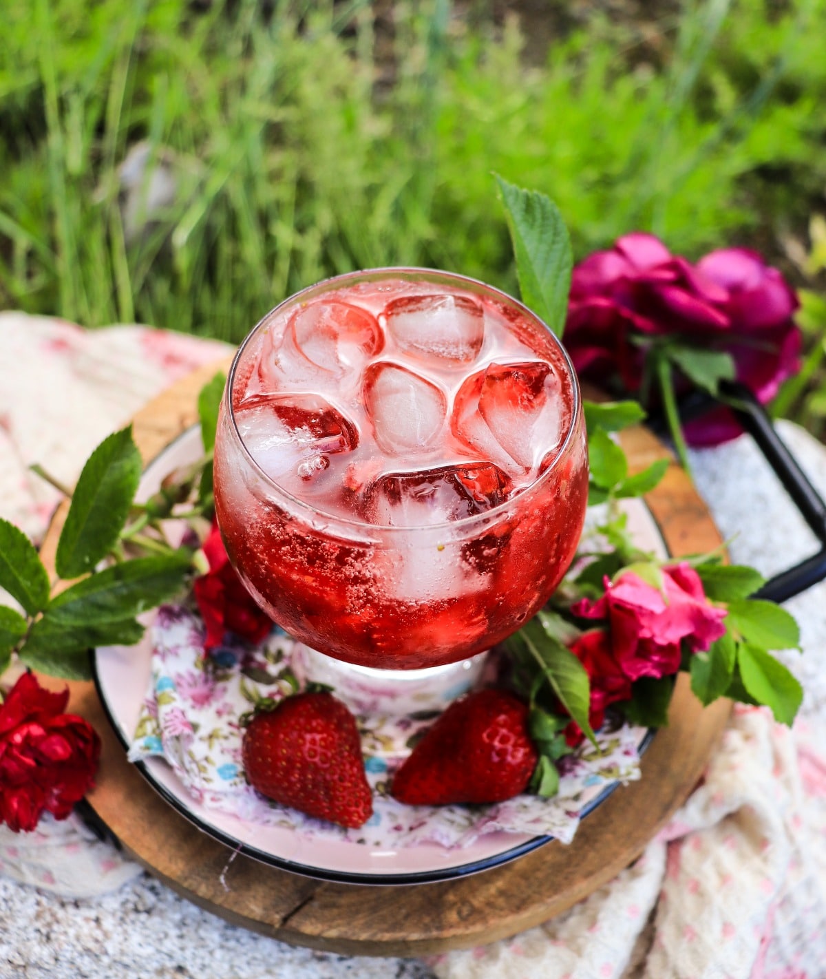 spritz with strawberries and rose petal syrup