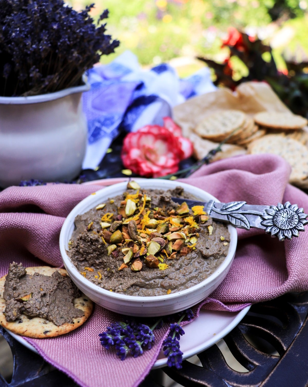 Chicken liver pâté with lavender topped with pistachios and orange zest