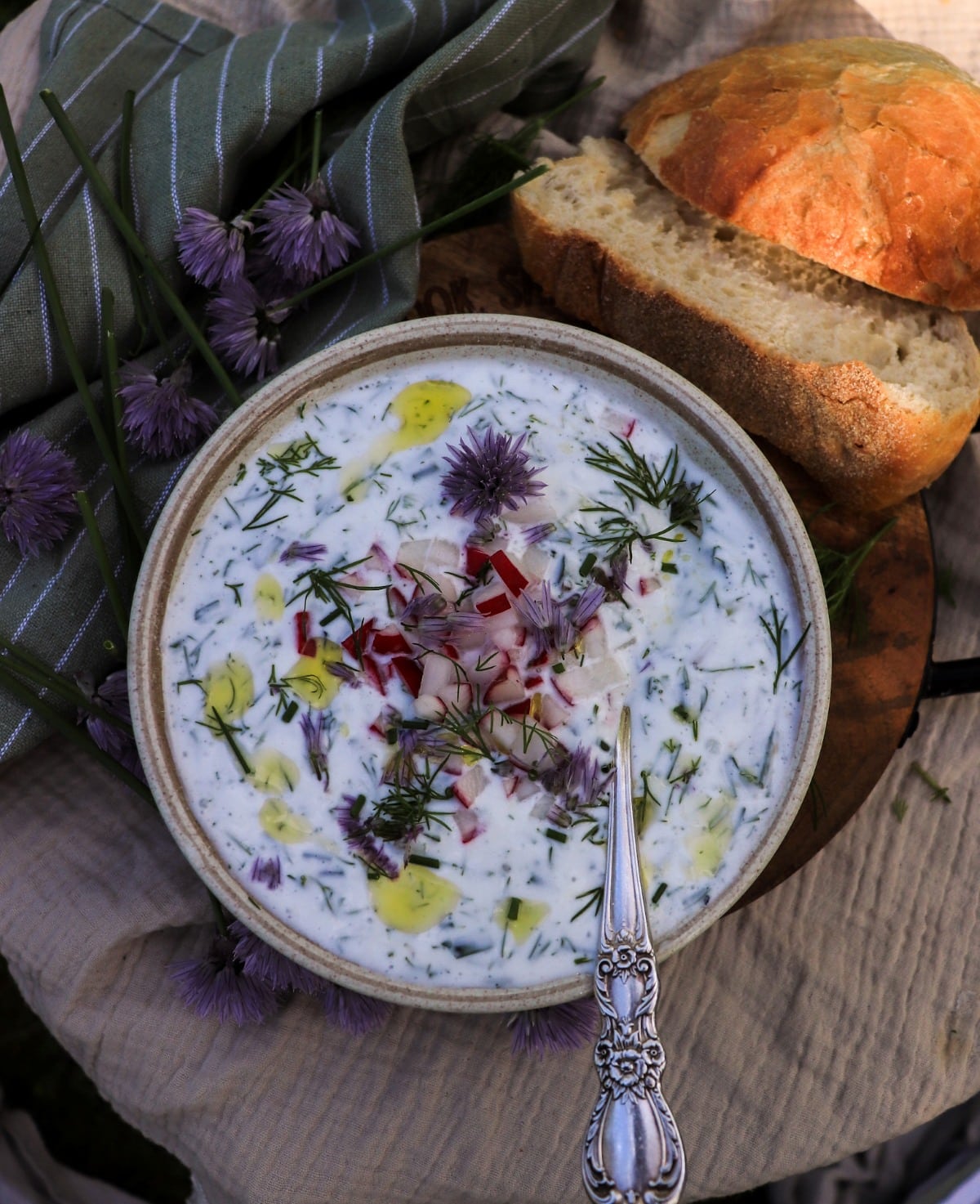 Cucumber kefir soup with dill, chives, radishes, and olive oil