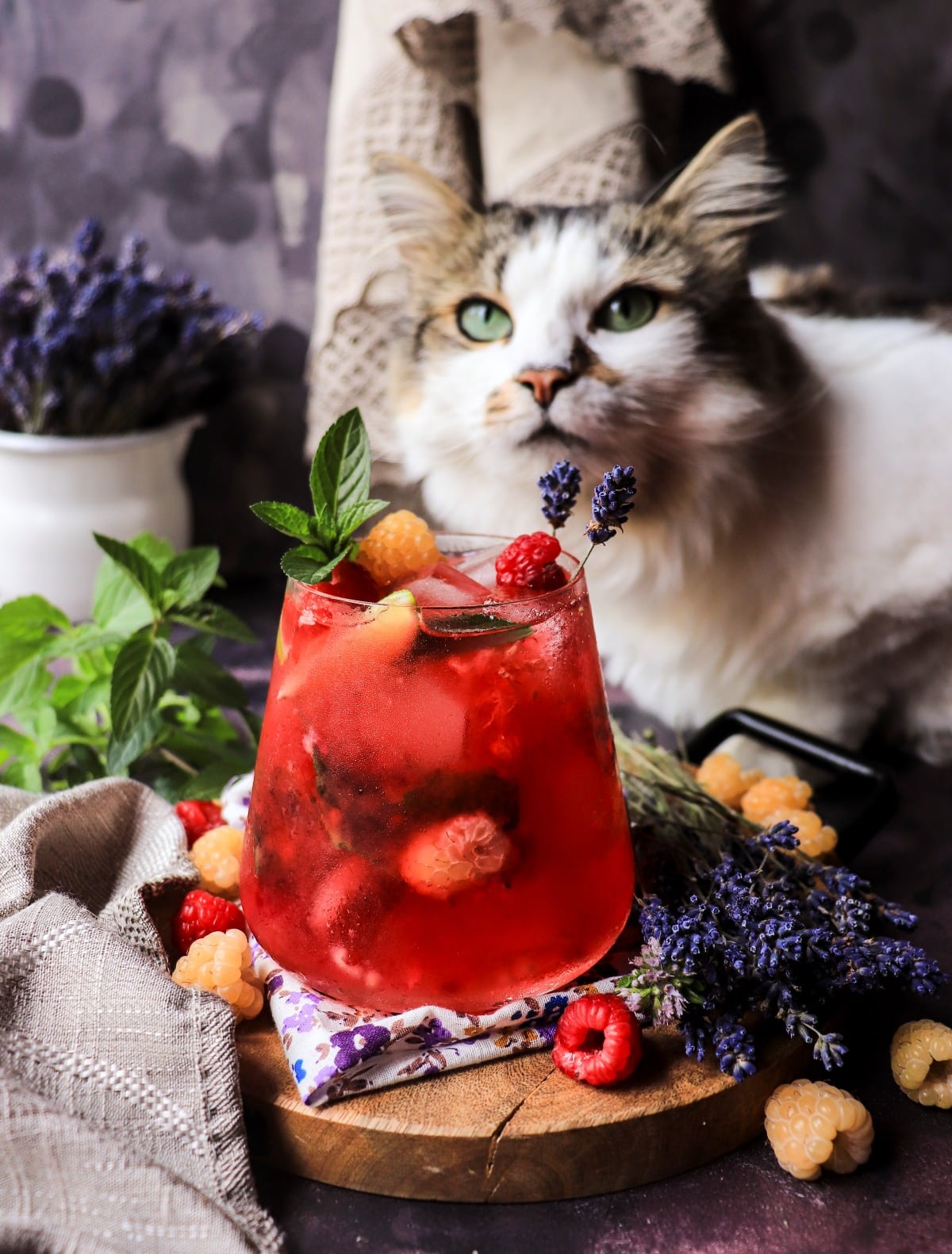 Lavender raspberry drink with fresh raspberries and mint