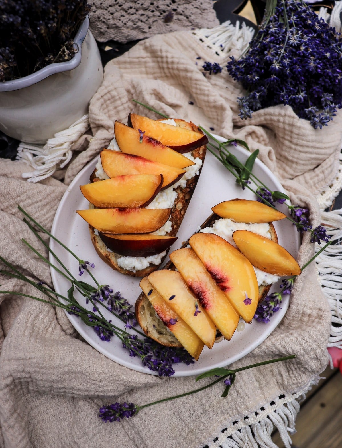 Ricotta toast with peaches and lavender