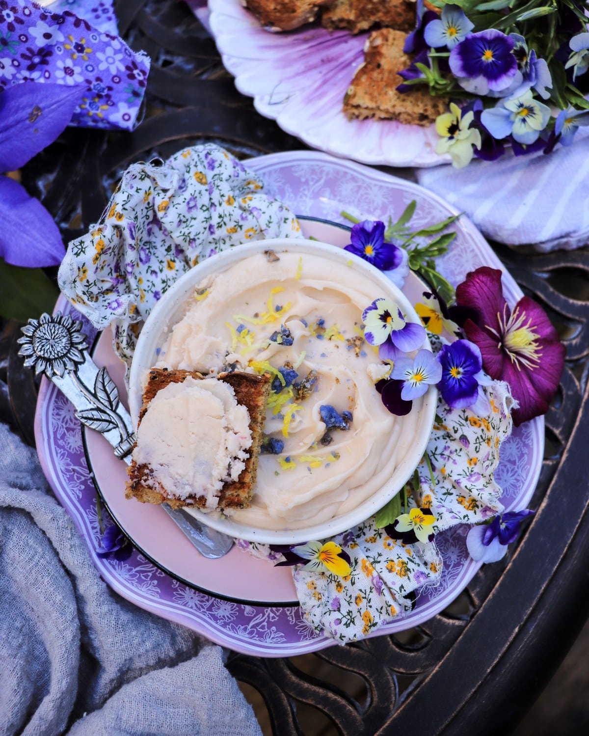 Sweet compound butter with honey, violet liqueur and lemon zest