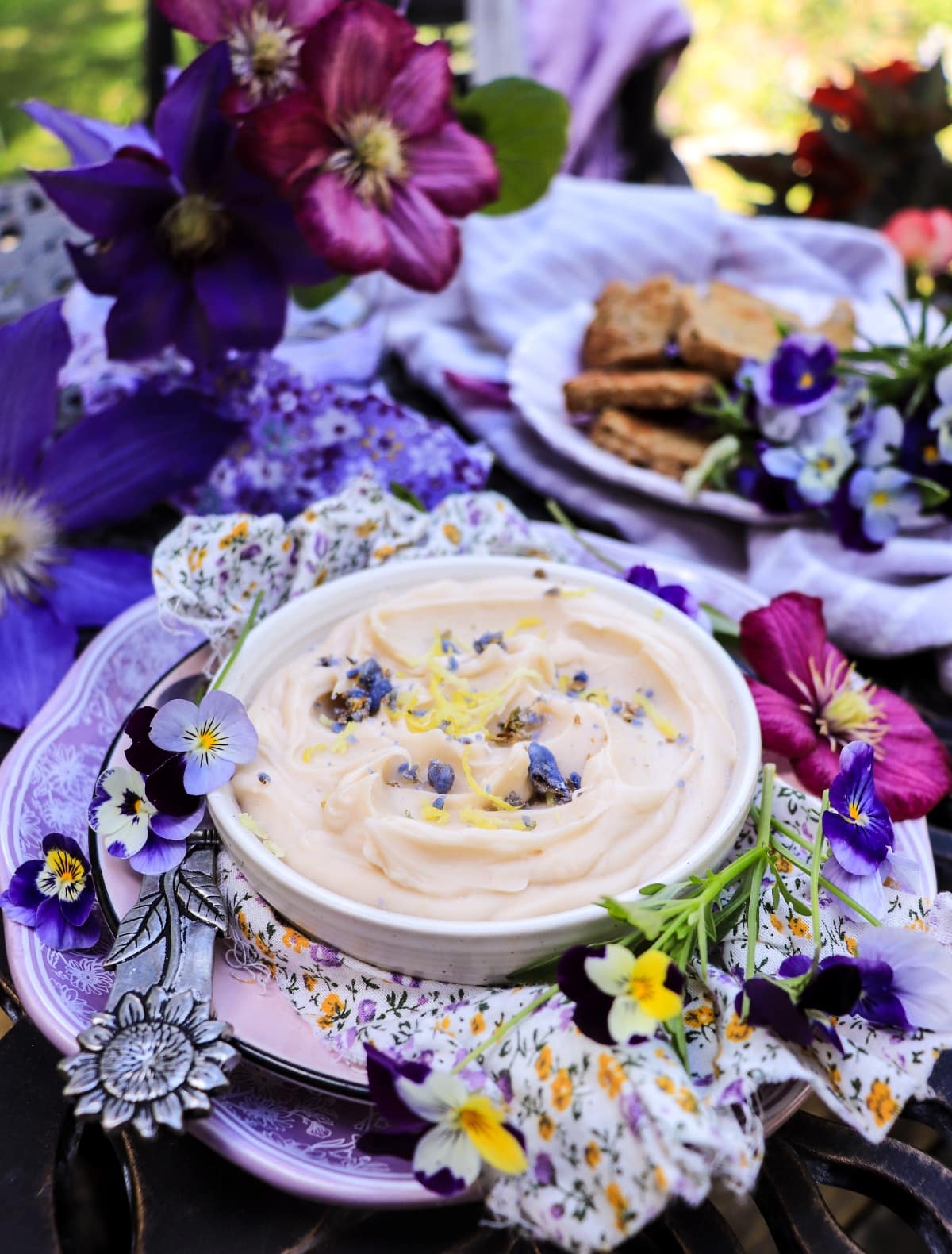 Sweet compound butter with honey, violet liqueur and lemon zest