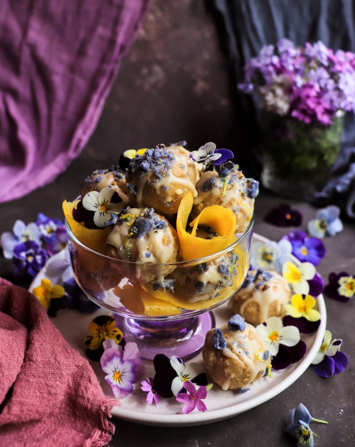 Violet liqueur truffles with white chocolate and lemon zest