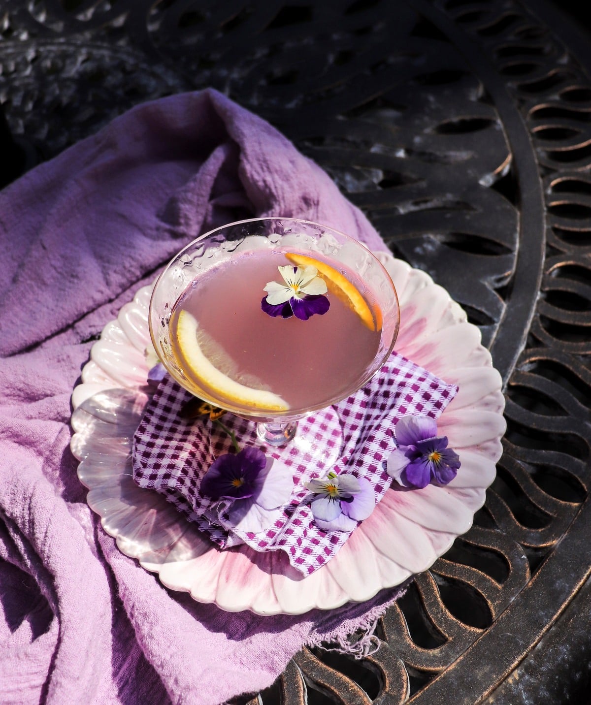 Water Lily cocktail with gin, orange liqueur and violet liqueur.