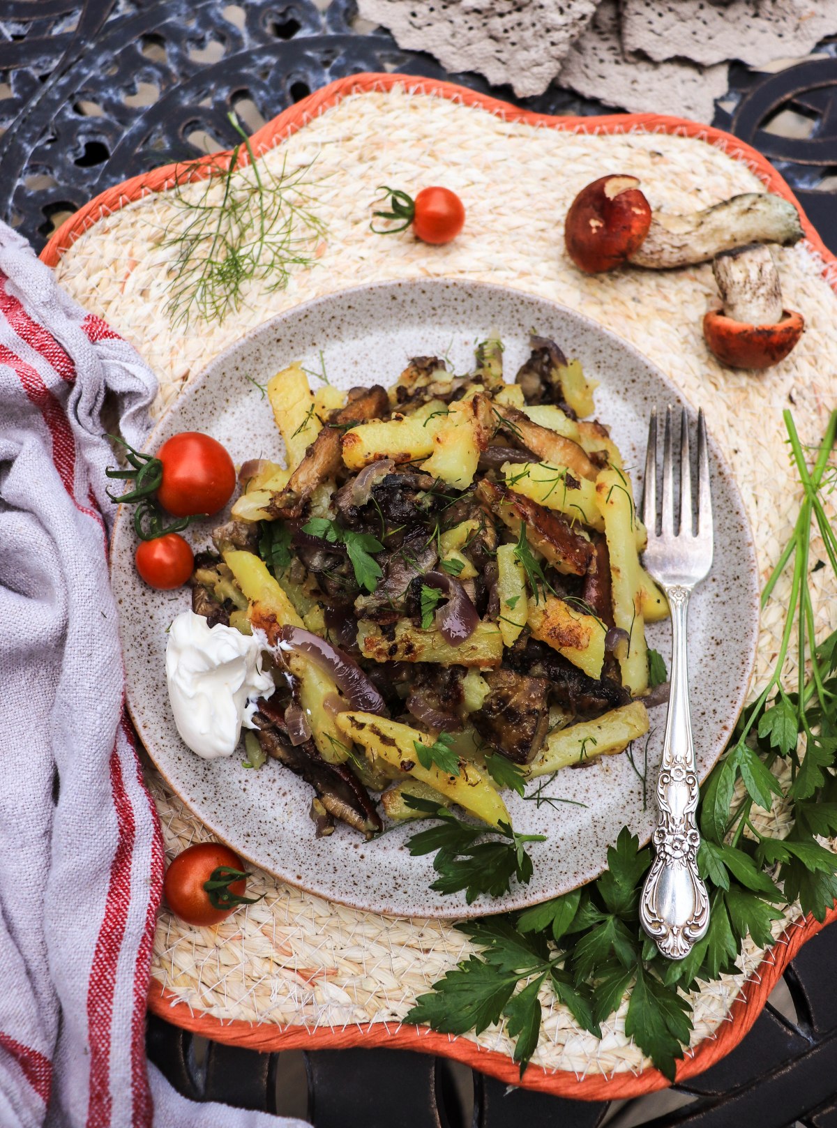 Eastern-European fried potatoes with wild mushrooms and onions and served with sour cream