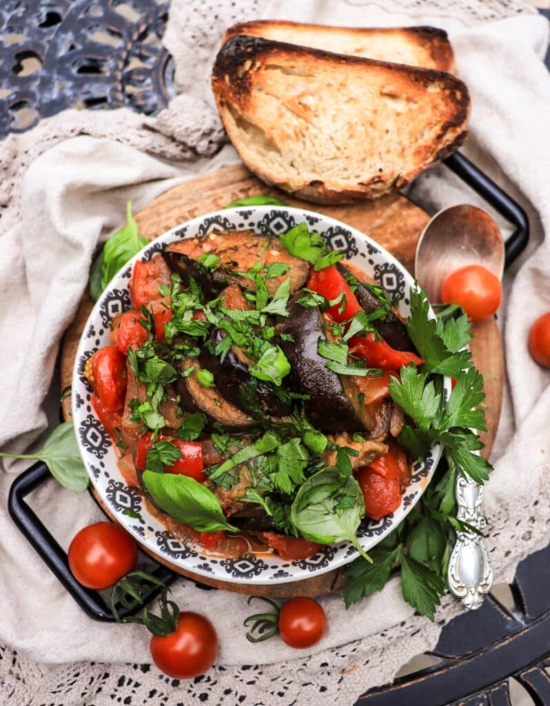 georgian stew with eggplant and herbs served with toasted bread