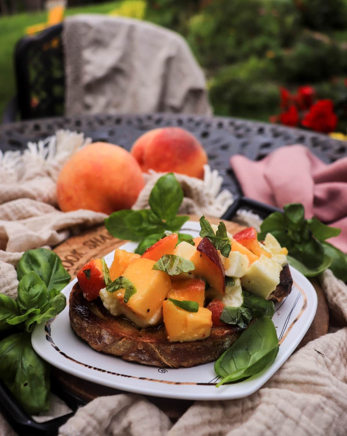 peach and mozzarella toast with basil
