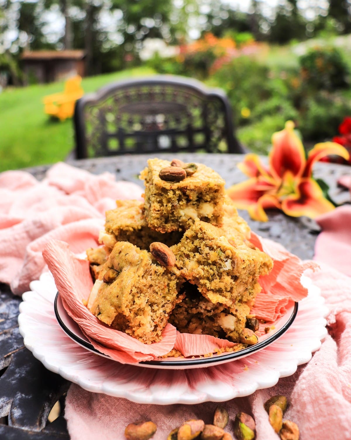 homemade pistachio cake bars with white chocolate chips and orange