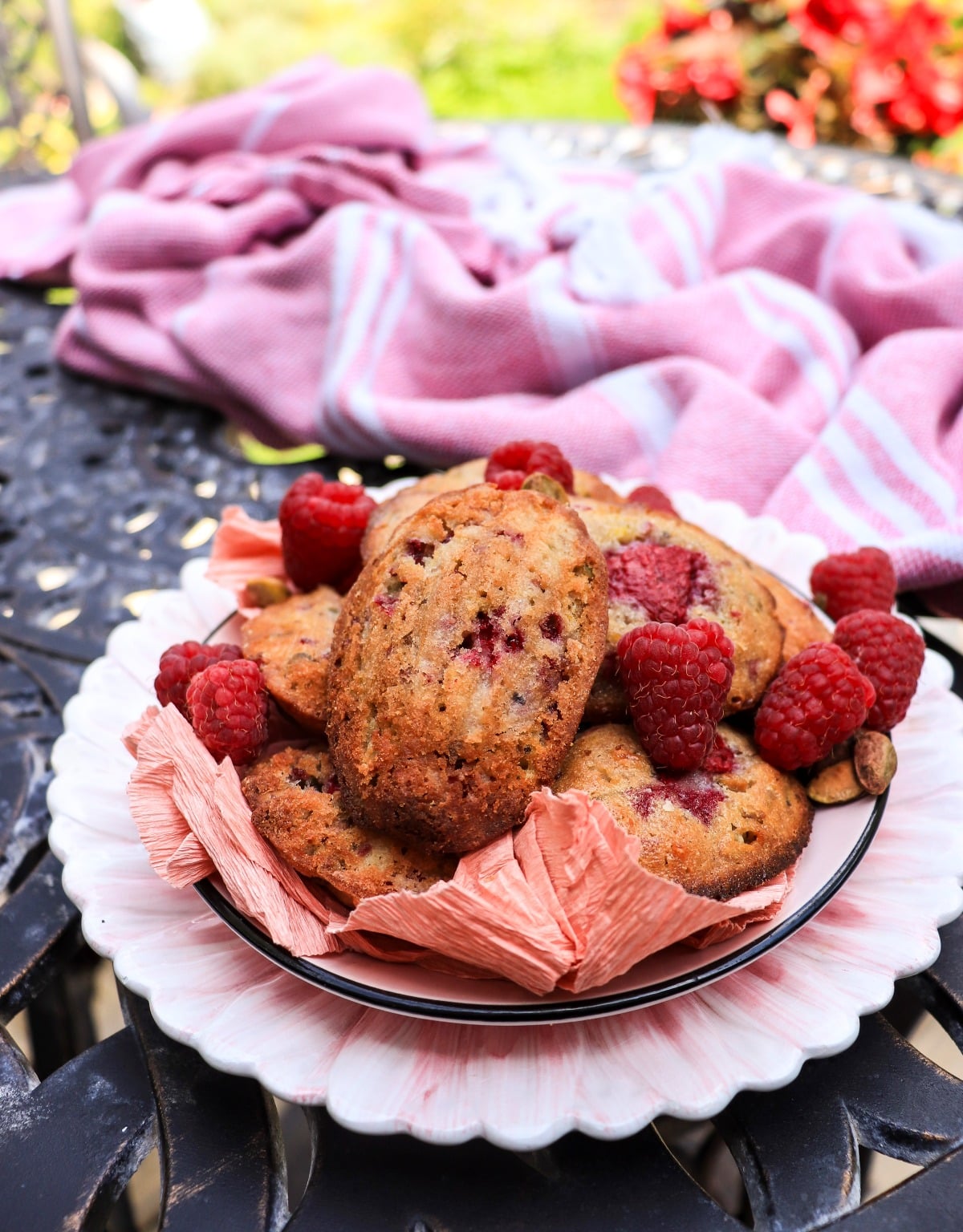 pistachio madeleines with raspberries and white chocolate