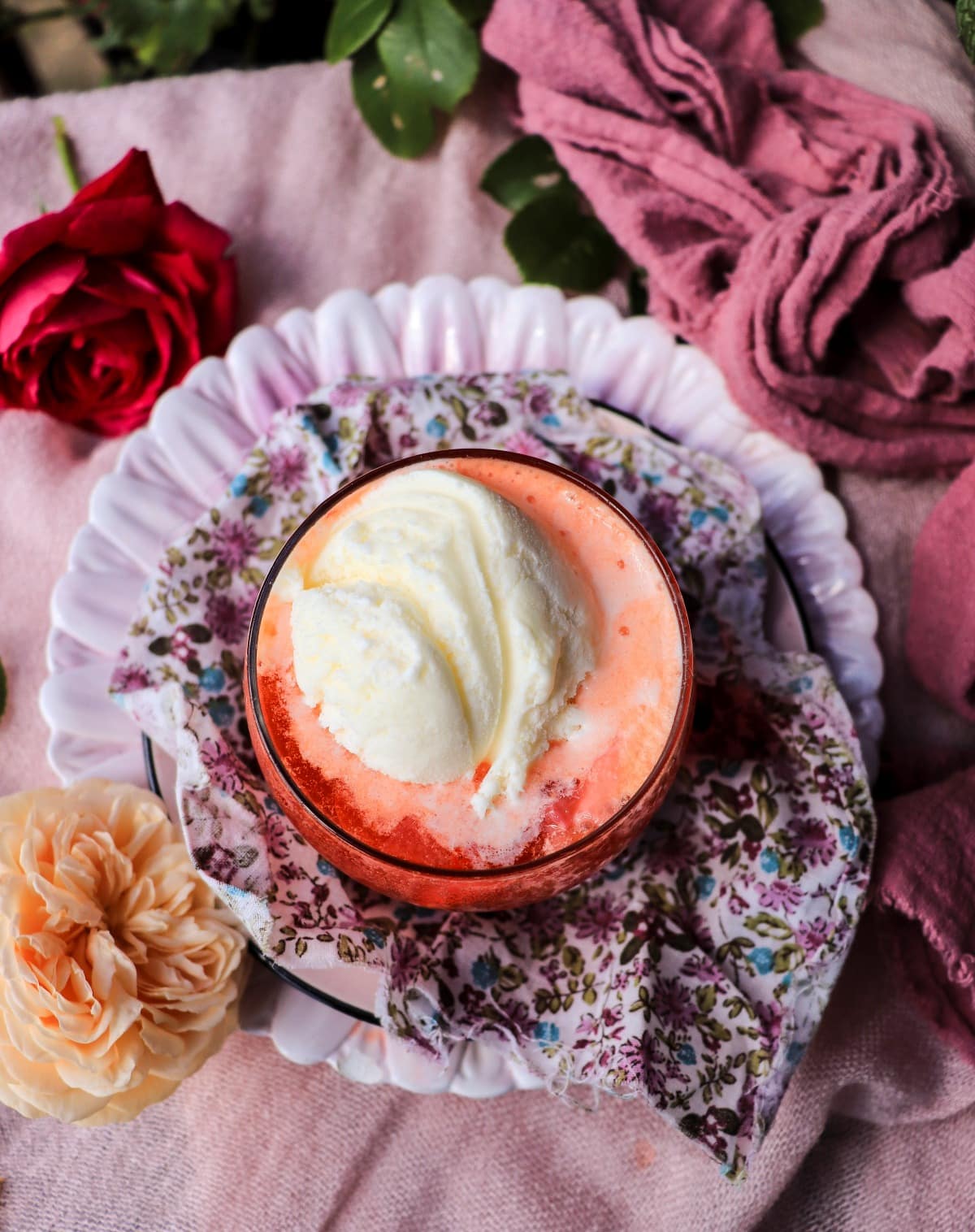 rose orange soda float with vanilla ice cream