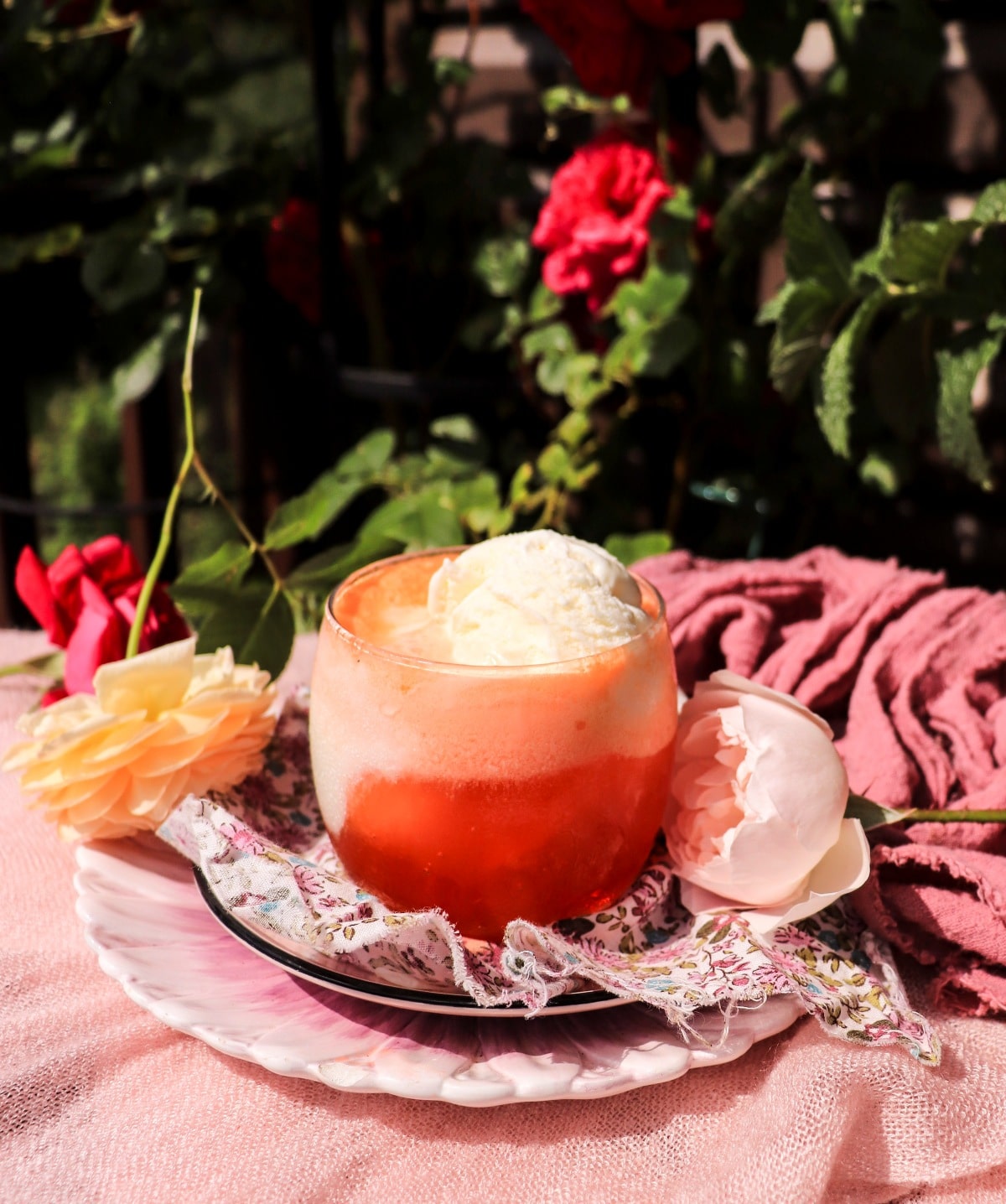 orange soda float with rose syrup and vanilla ice cream