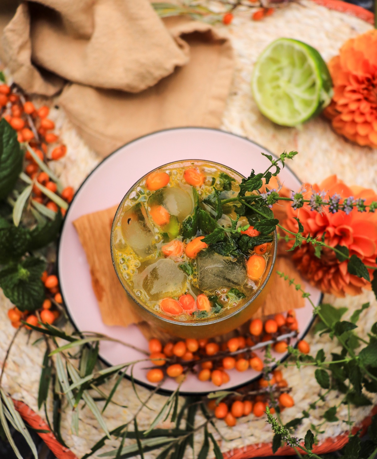 Mojito with sea buckthorn berries and fresh mint