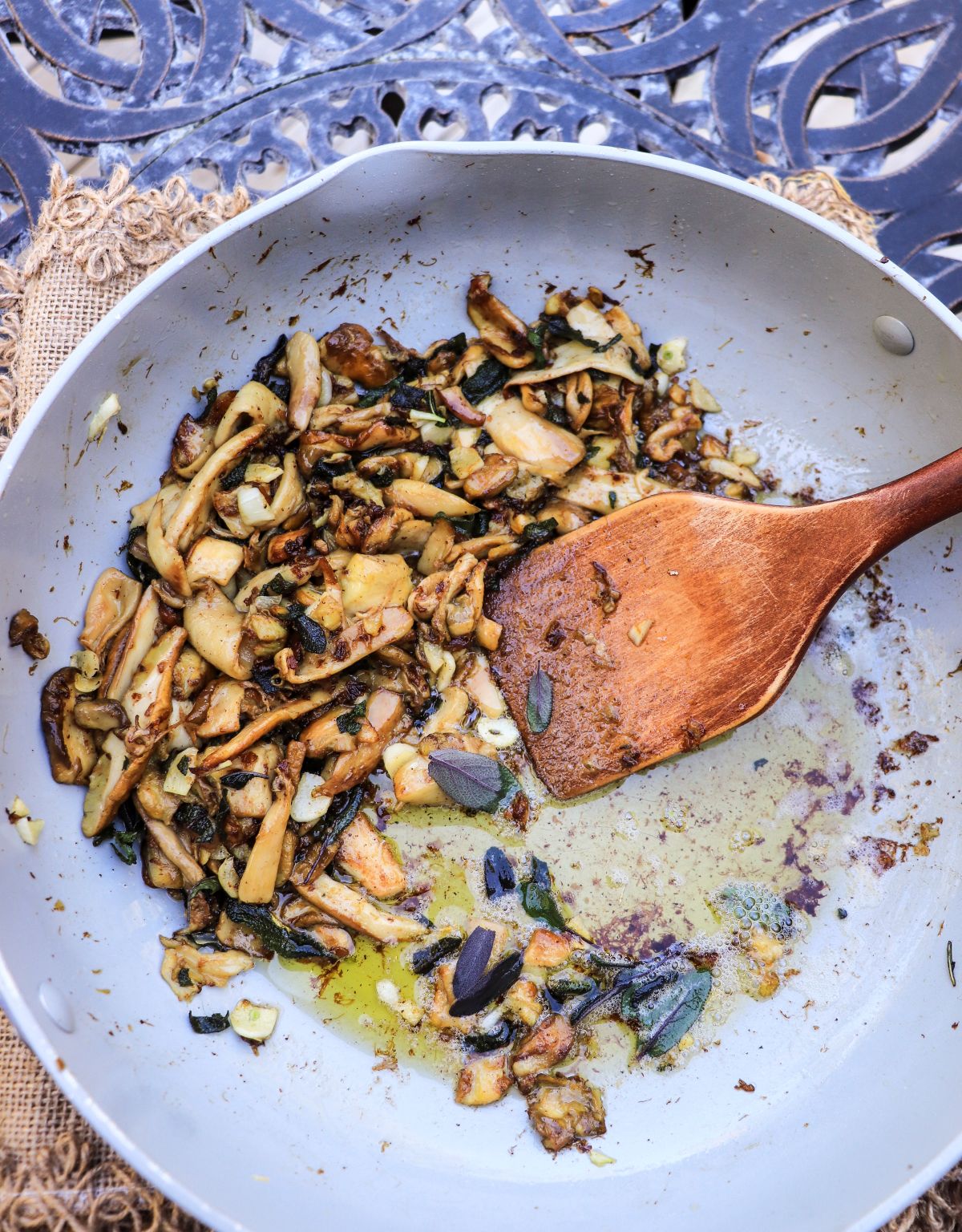 sautéing porcini mushrooms with garlic and sage for pasta