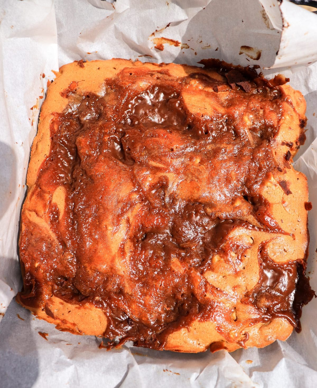 baked dulce de leche cake bars in pan before slicing