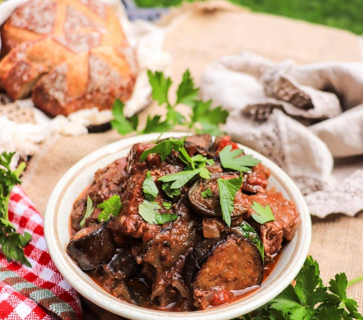 Greek beef stew with eggplant and red wine tomato sauce