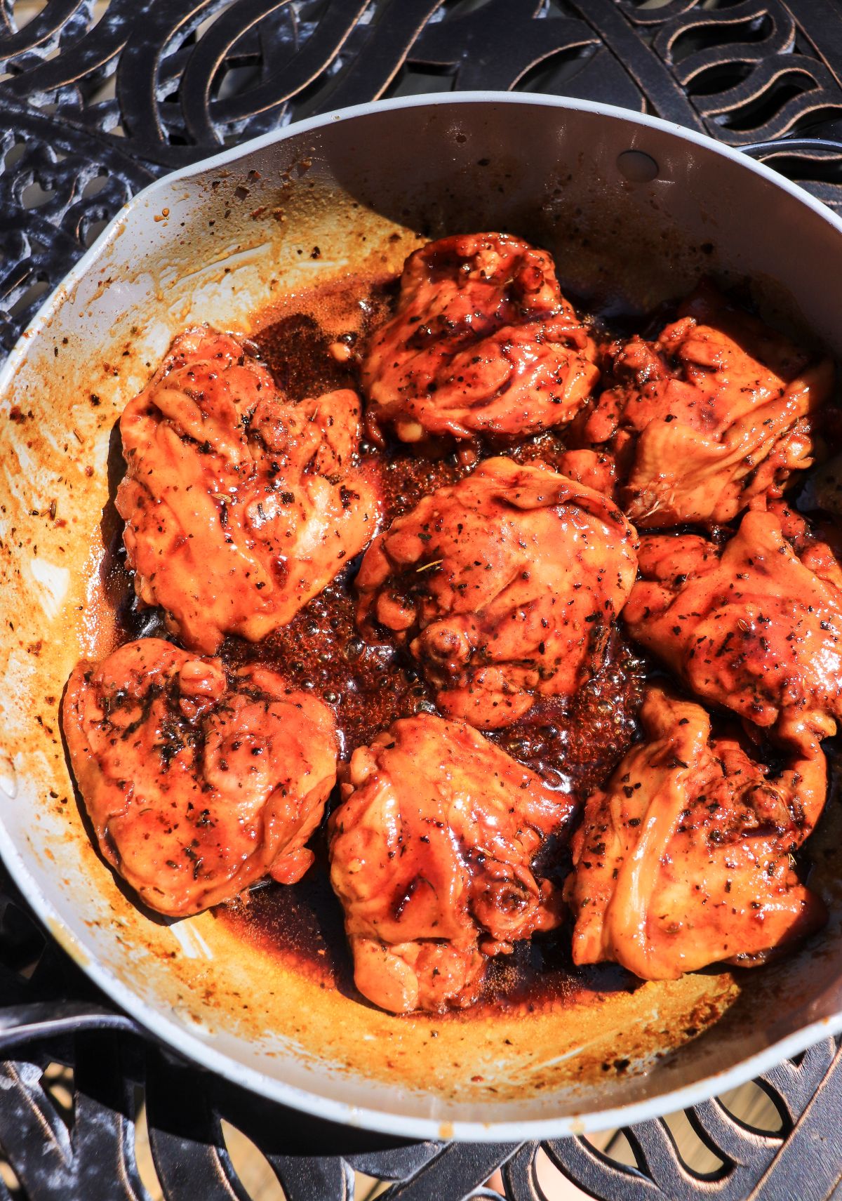 pan-cooked maple soy chicken thighs in a pan