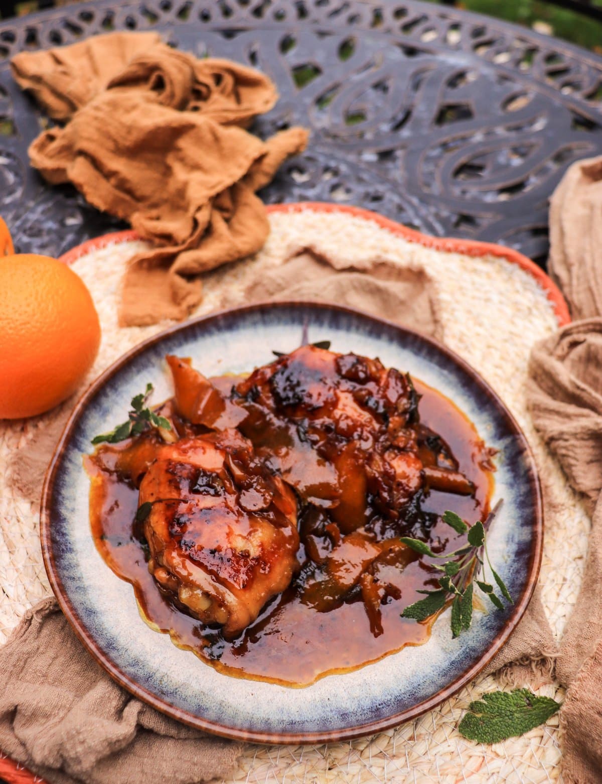 glazed orange maple chicken thighs with soy sauce and sage