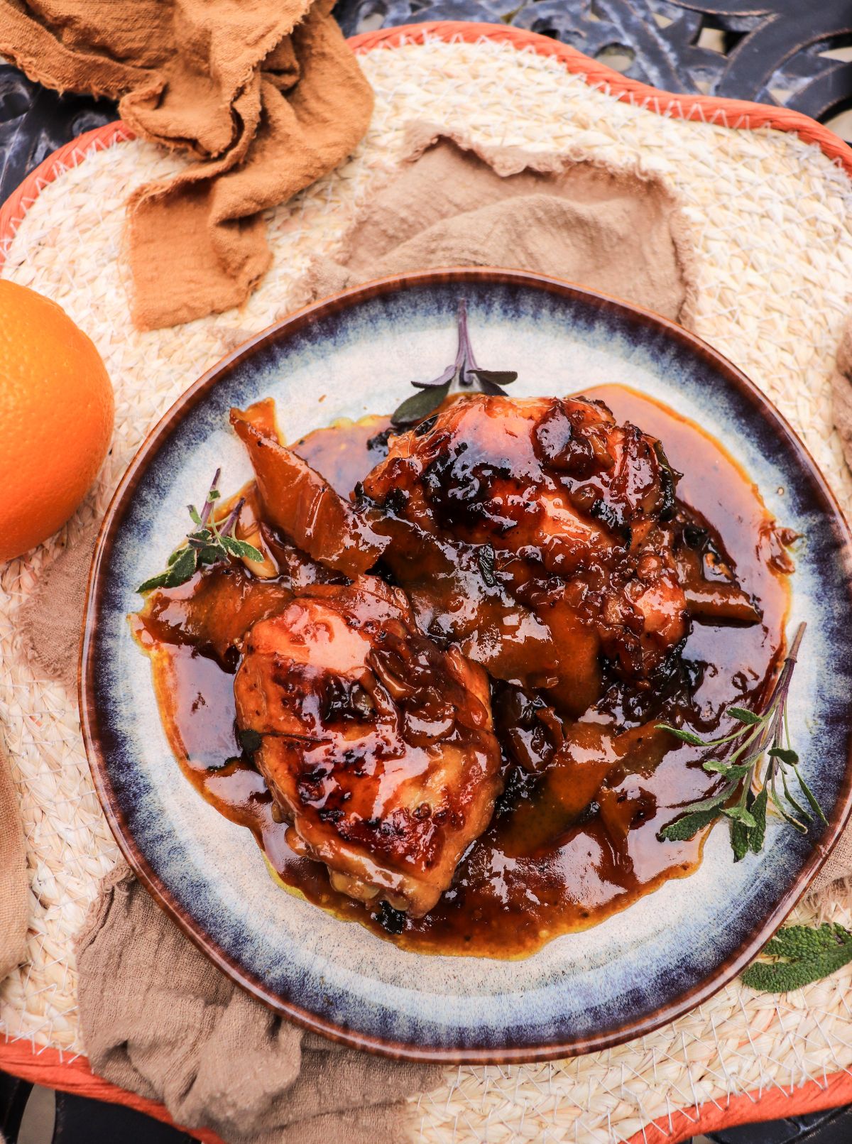 skillet chicken thighs with a sticky orange maple glaze and sage