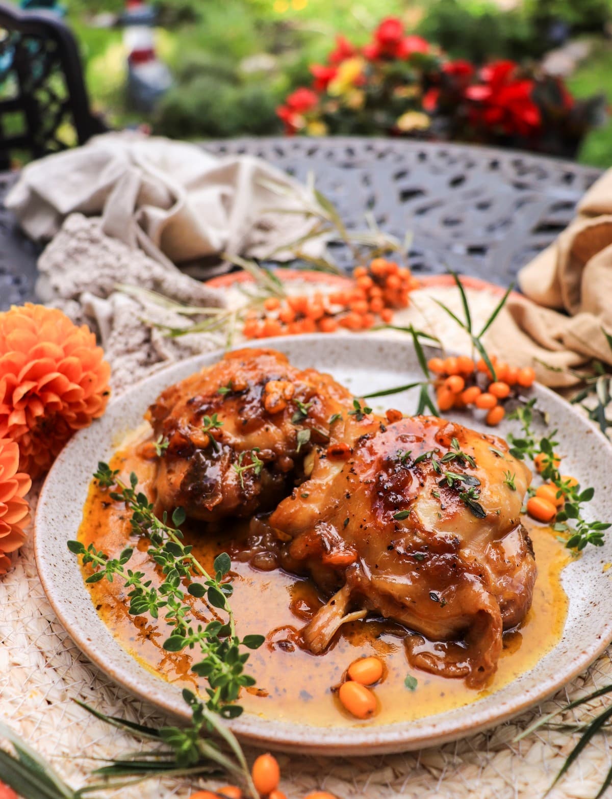 one pan fried chicken thighs with sea buckthorn glaze and fresh thyme